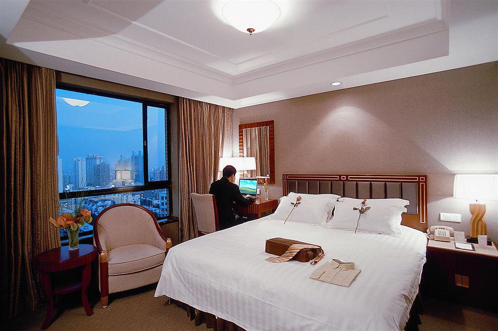 Shanghai Everbright International Hotel Quarto foto